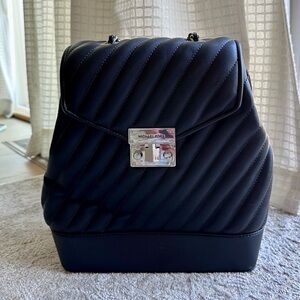 MICHAEL KORS MEDIUM CHAIN BACKPACK QUILTED, like new